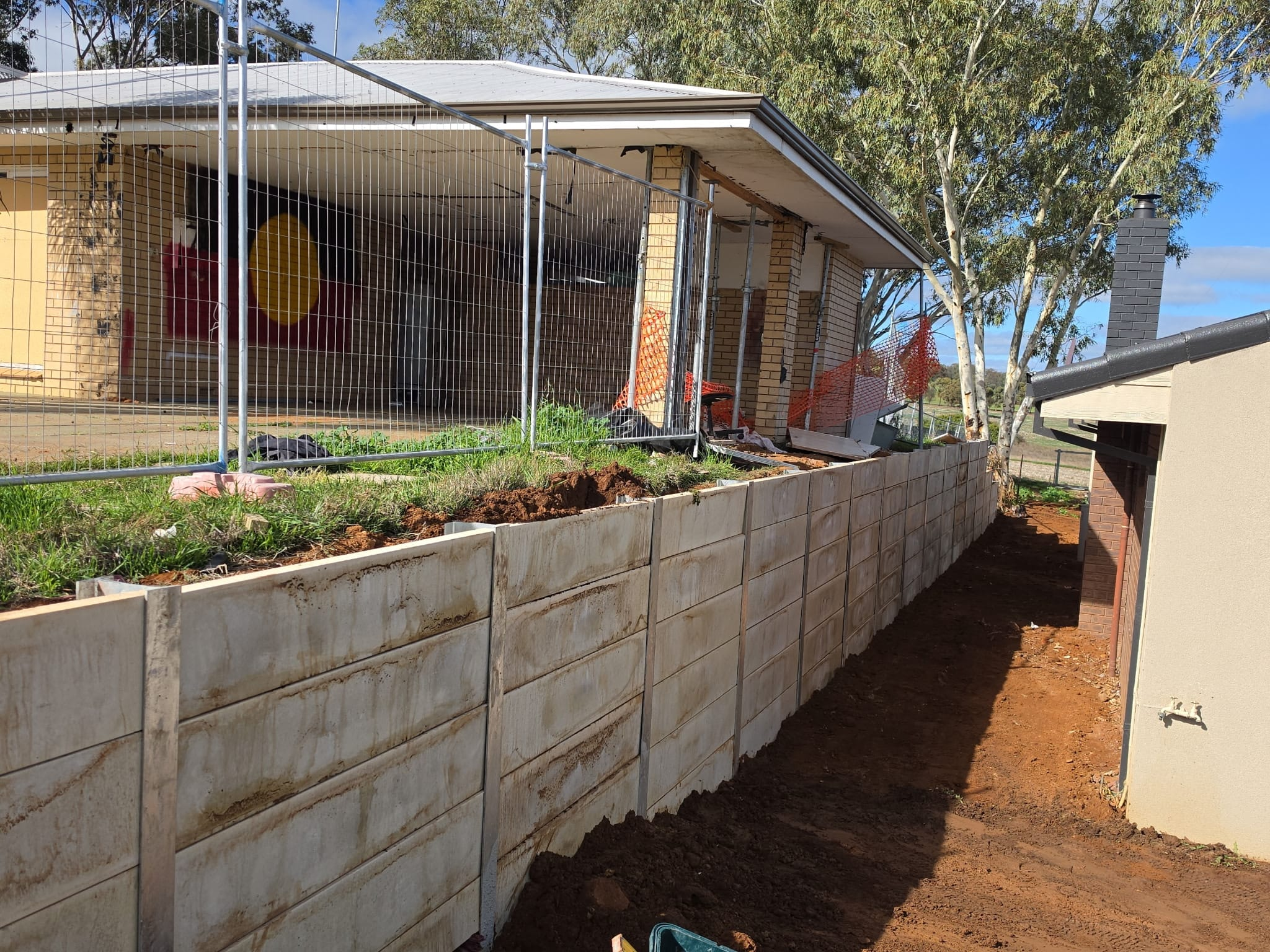 Concrete sleeper retaining wall built at a regional WA community building